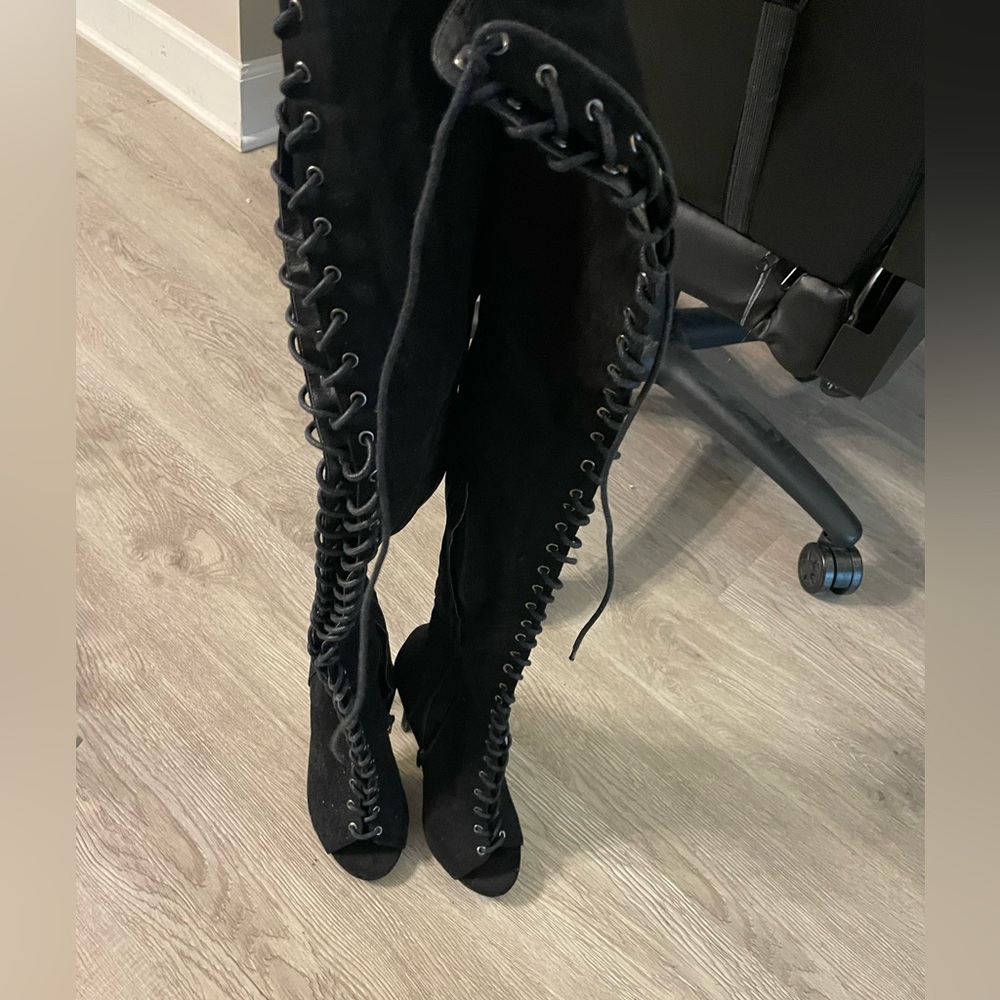Thigh high black boots